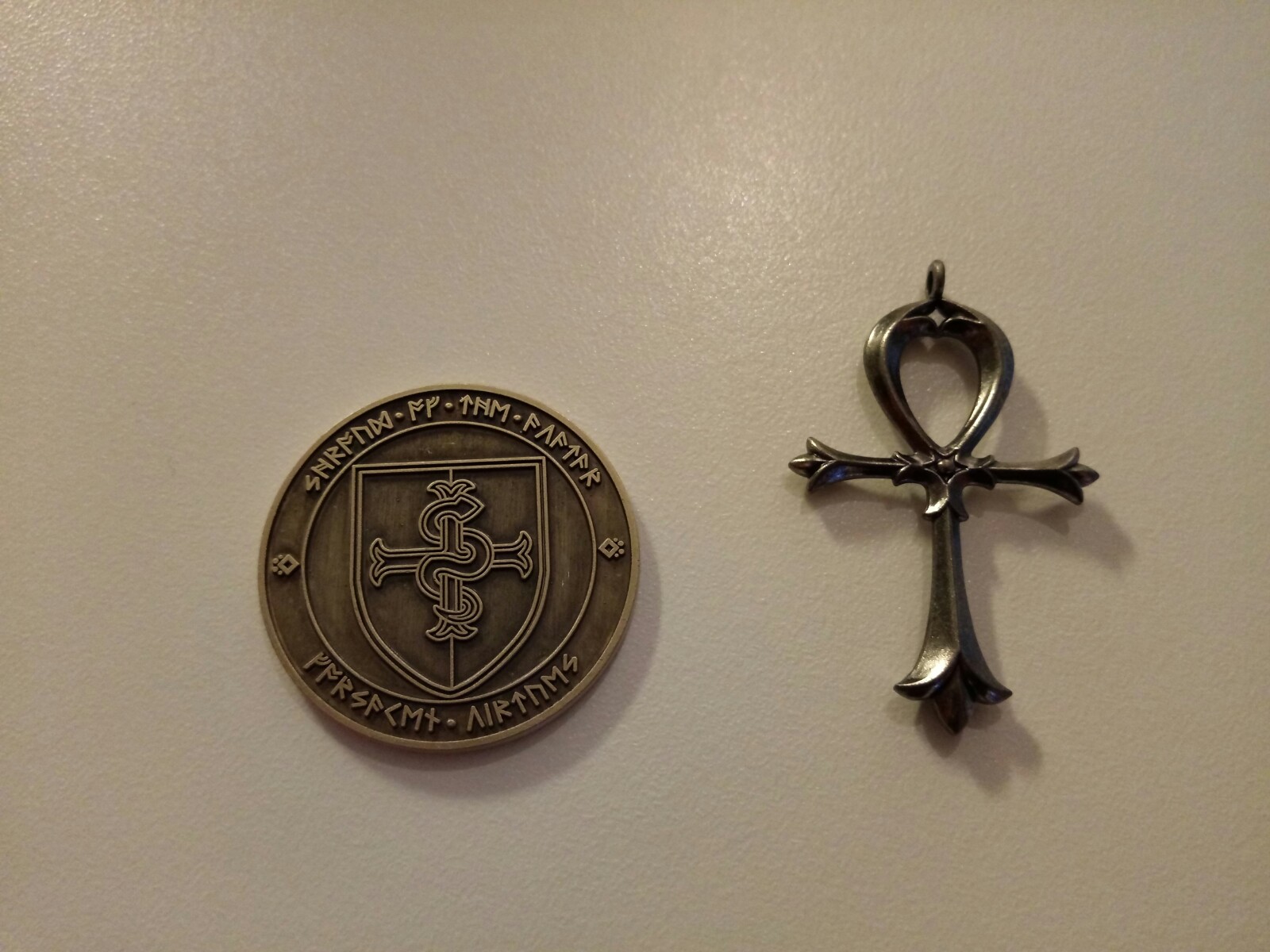 Backside of coin and ankh