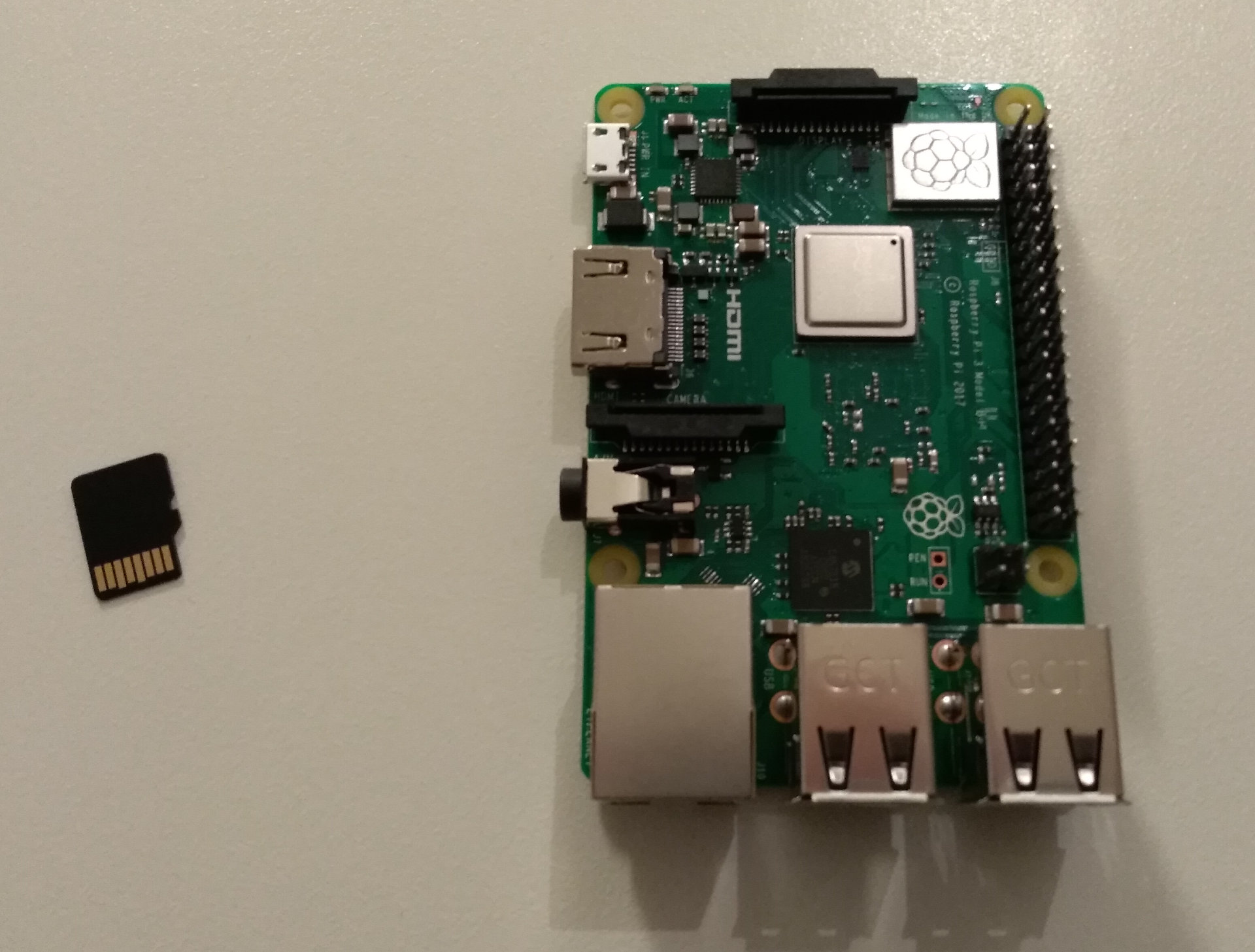 Raspberry Pi and MicroSD card side by side